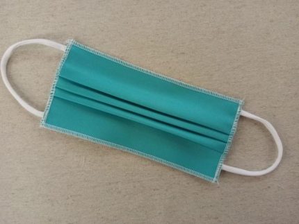 MASCHERINA VERDE IN COTONE DOPPIO STRATO E POLIESTERE - APRIBILE - NON MEDICA - NON DPI